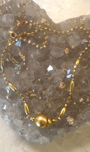 One of a kind gold pearl